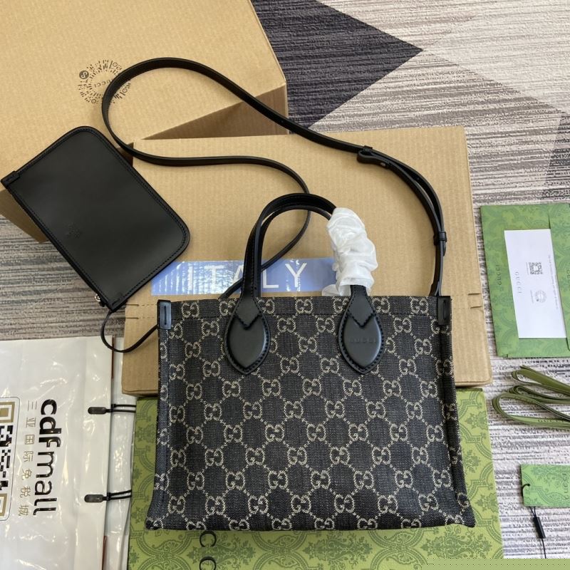 G*u*i shopping bags